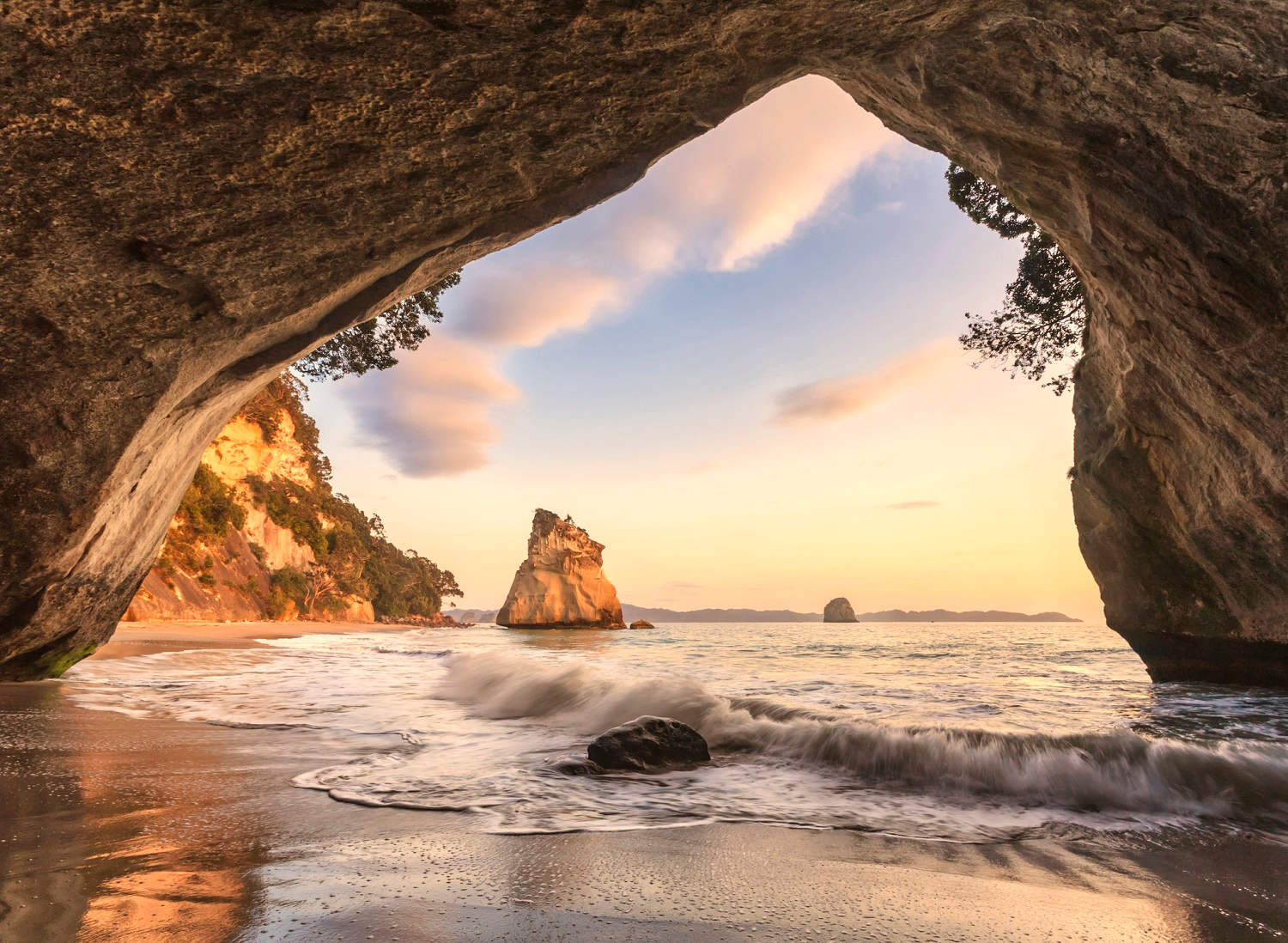 Cathedral Cove incoming tide sunset, Hahei, New Zealand