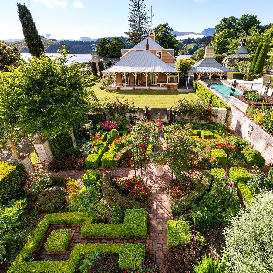 Looking over the red garden to the Ohinetahi house, New Zealand @ohinetahi