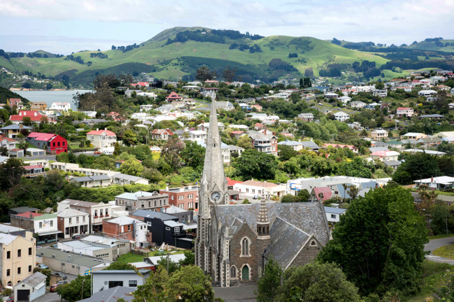 Port Chalmers with the distinctive spire of Iona Church in foreground, Otago, New Zealand