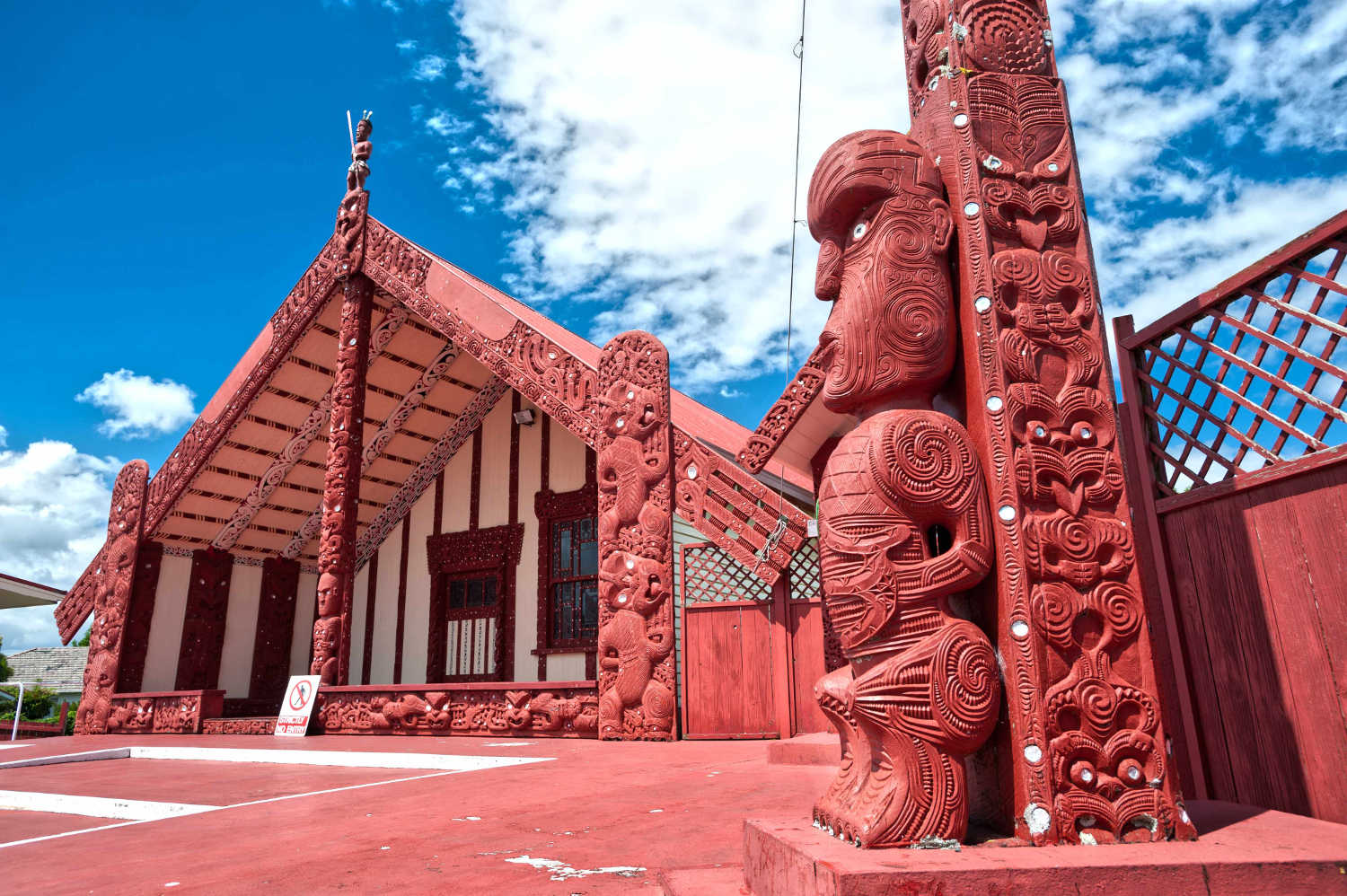 This image shows a maori marae (meeting house and meeting ground), New Zealand