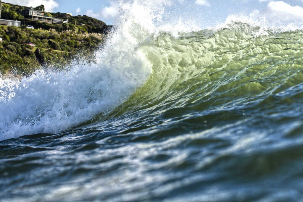 Massive point break waves Raglan surf culture NZ