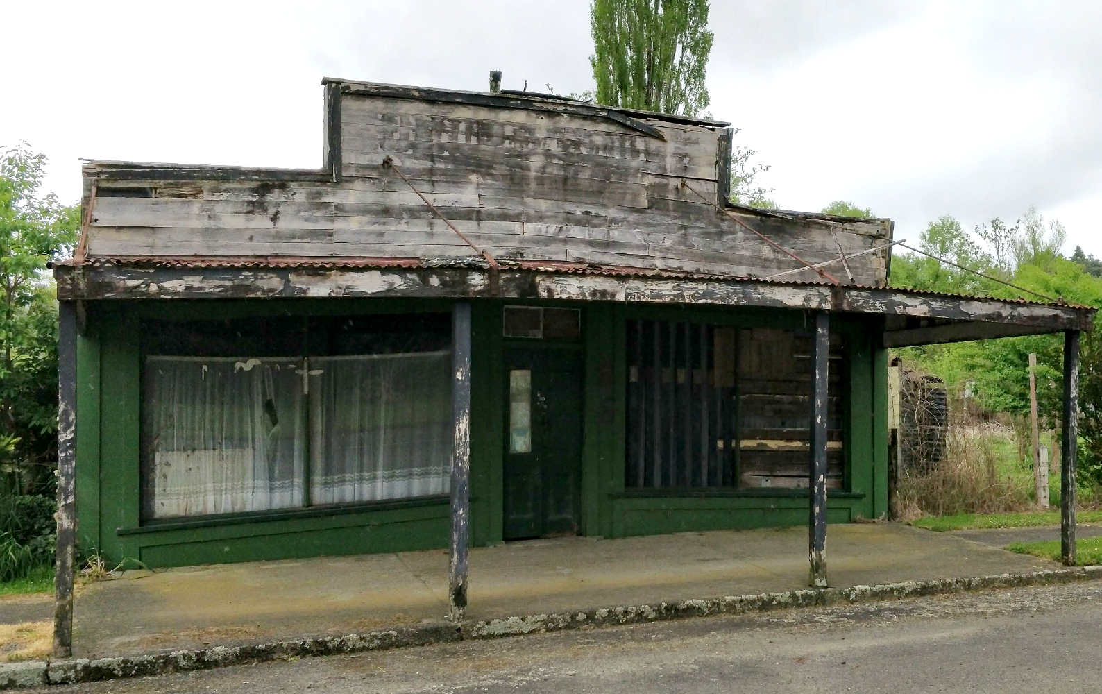 Ghosts, rusting machinery and derelict shops on the Forgotten Highway 43 North Island, New Zealand