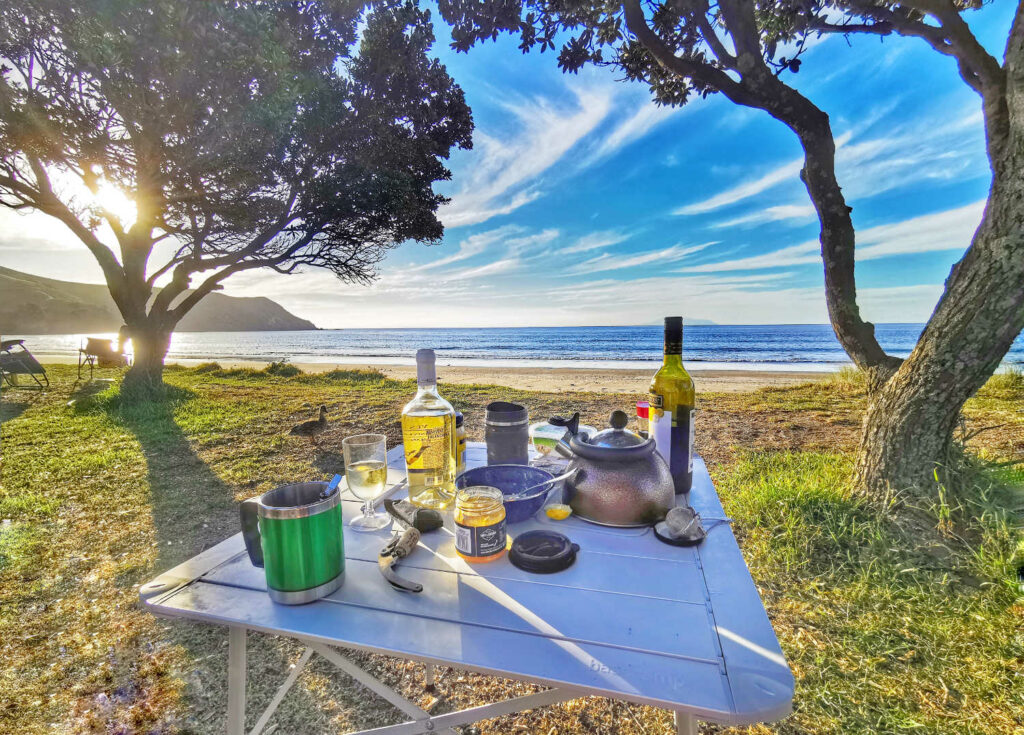 Picnic for two, a bit of planning, foldup table and nature provides the glorious setting Coromandel Peninsula, NZ
