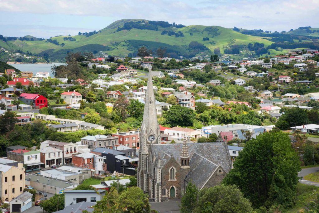 Port Chalmers with the distinctive spire of Iona Church in foreground, Otago, New Zealand