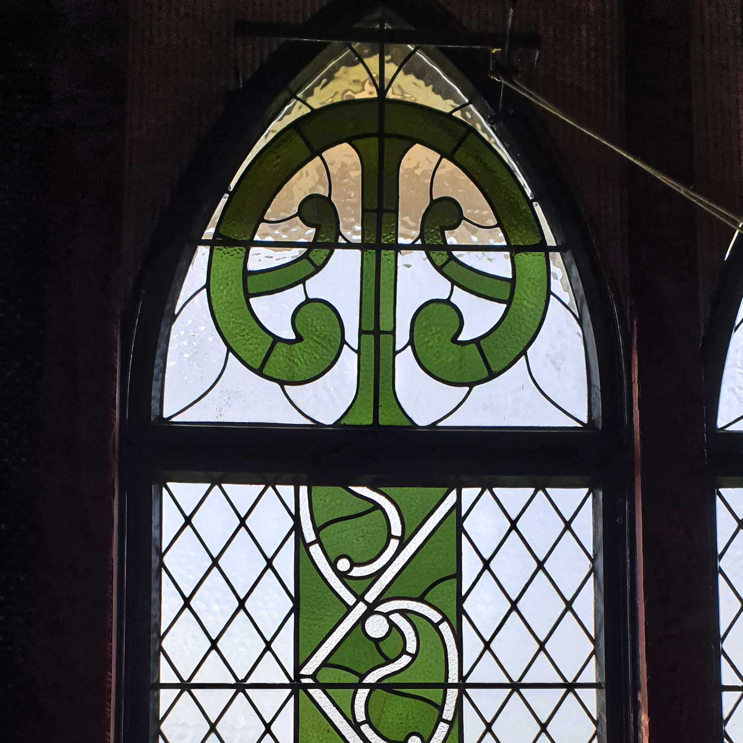 St Faith's church Victorian triangle lead windows with Maori motifs, New Zealand