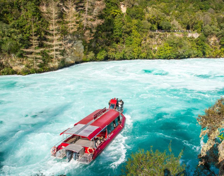 Tourist adventure in Huka Falls with Huka falls river cruise in Taupo, New Zealand