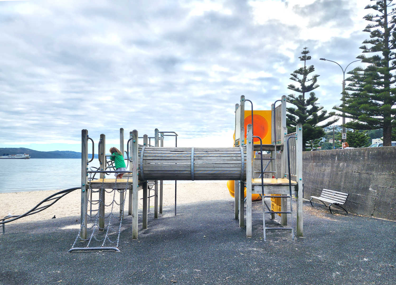 Wellington Oriental Parade children's playground overlooking sandy beach, North Island, NZ