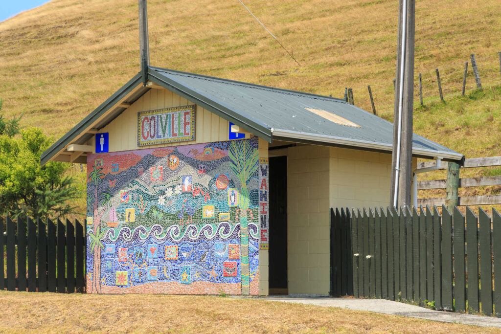 Elaborately decorated public toilet on the outskirts of Colville, New Zealand