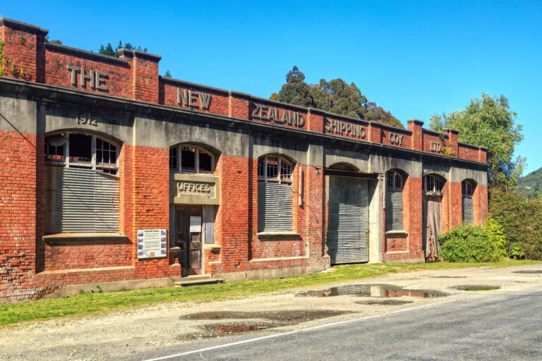 Closed meat works factory, closed shipping company offices, The buildings, a shipping company office and wool store (1912) brick building Tokomaru Bay East coast of New Zealand`s North Island