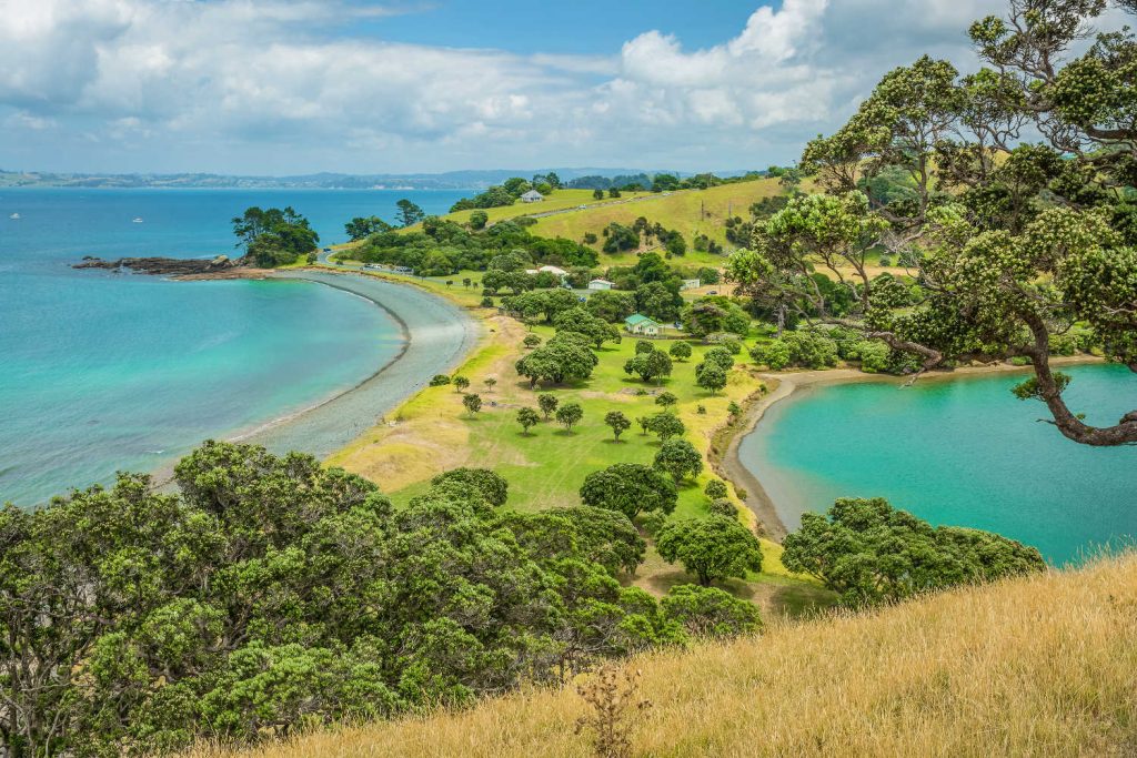 In Tawharanui Regional Park, north of Auckland, New Zealand, a top view of the strip of land between the lake and the bay