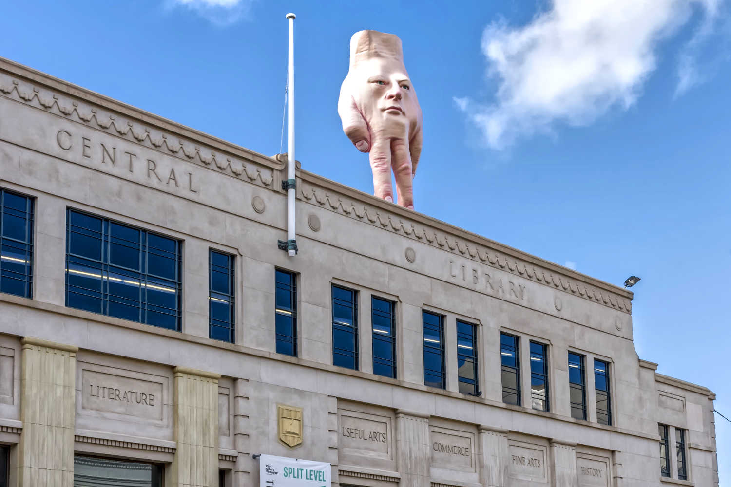 Ronnie van Hout Quasi sculpture on top of the Wellington City Art Gallery, New Zealand