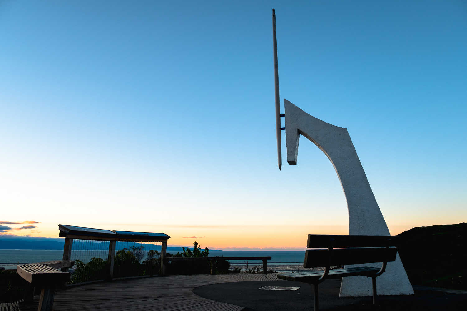 Centre of New Zealand monument at sunset, Nelson