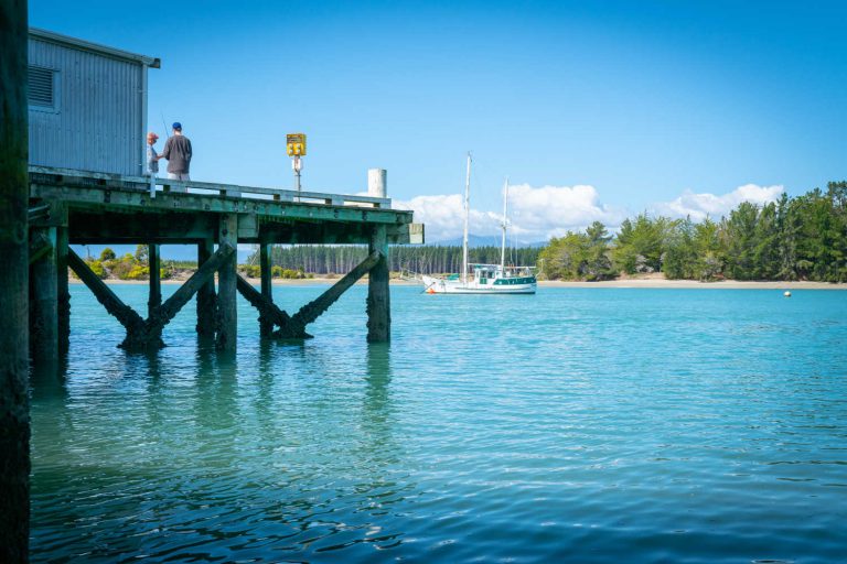 Wharf on inlet know as Waimea Estuary in small coastal township on Tasman Bay in South Island New Zealand, Mapua New Zealand