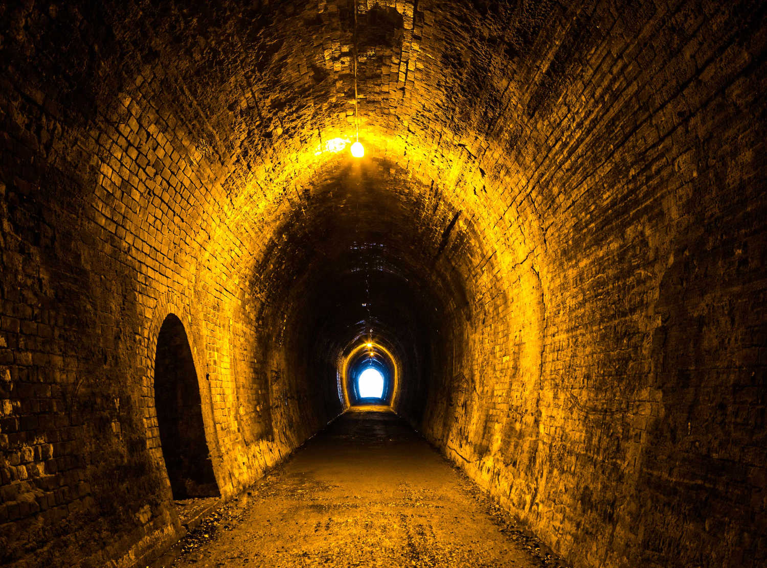 Historic rail tunnel, a part of an old gold mine transportation system, Karangahake Gorge, New Zealand