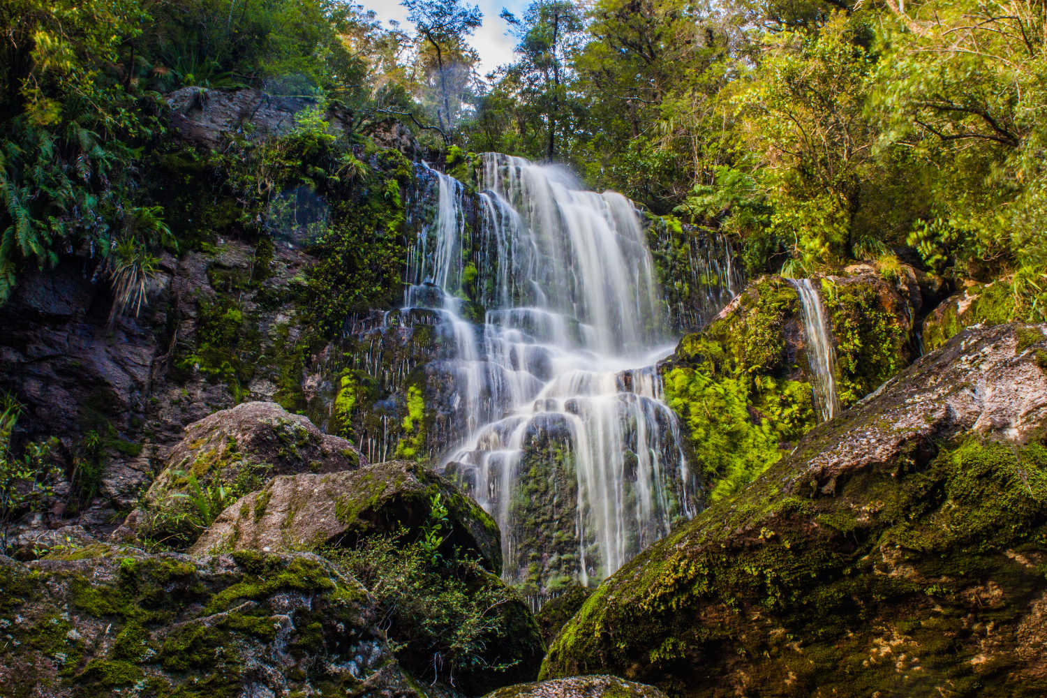 Waterfall in Charming Creek walkway, West Coast, Karamea, New Zealand