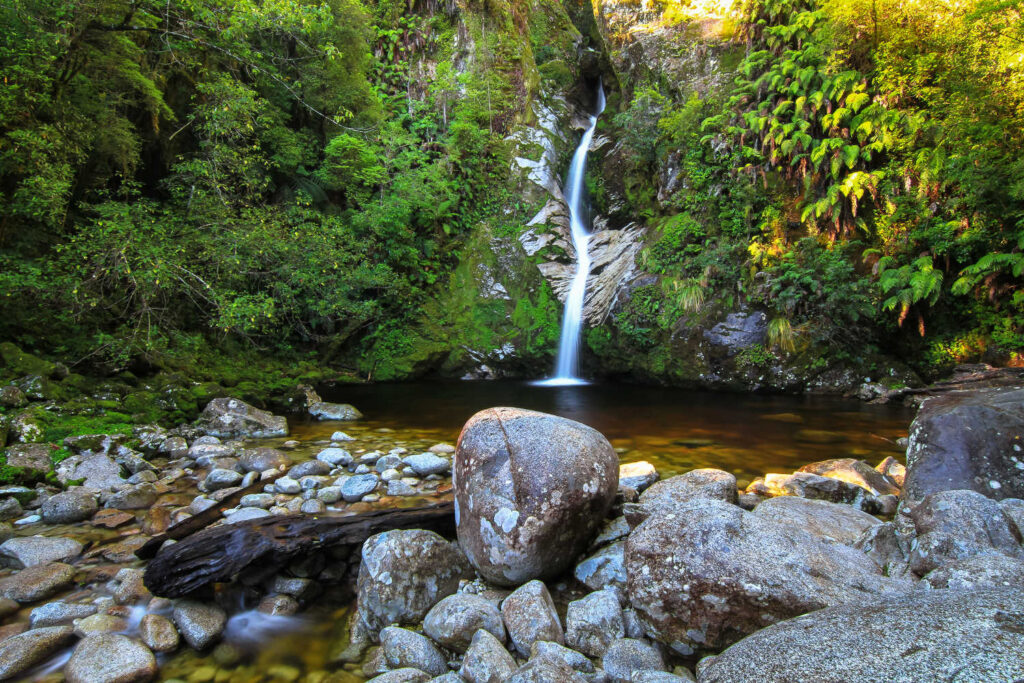 Dorothy Falls, on the edge of Lake Kaniere in New Zealand