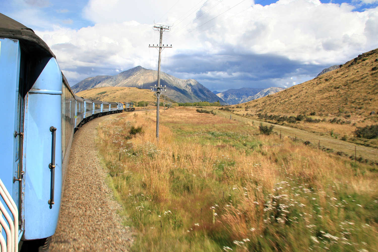 The TranzAlpine Express Train travels through the Southern Alps, Otago, South Island, New Zealand