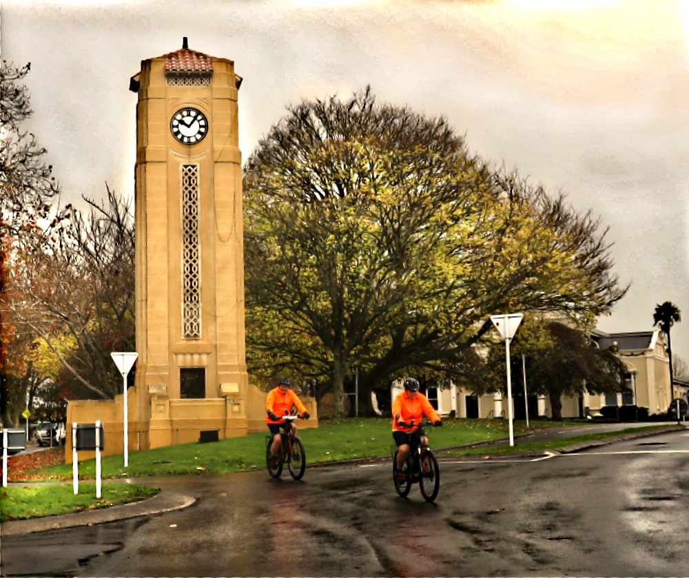 Cambridge town clock tower, cyclists, winter days, Waikato, New Zealand