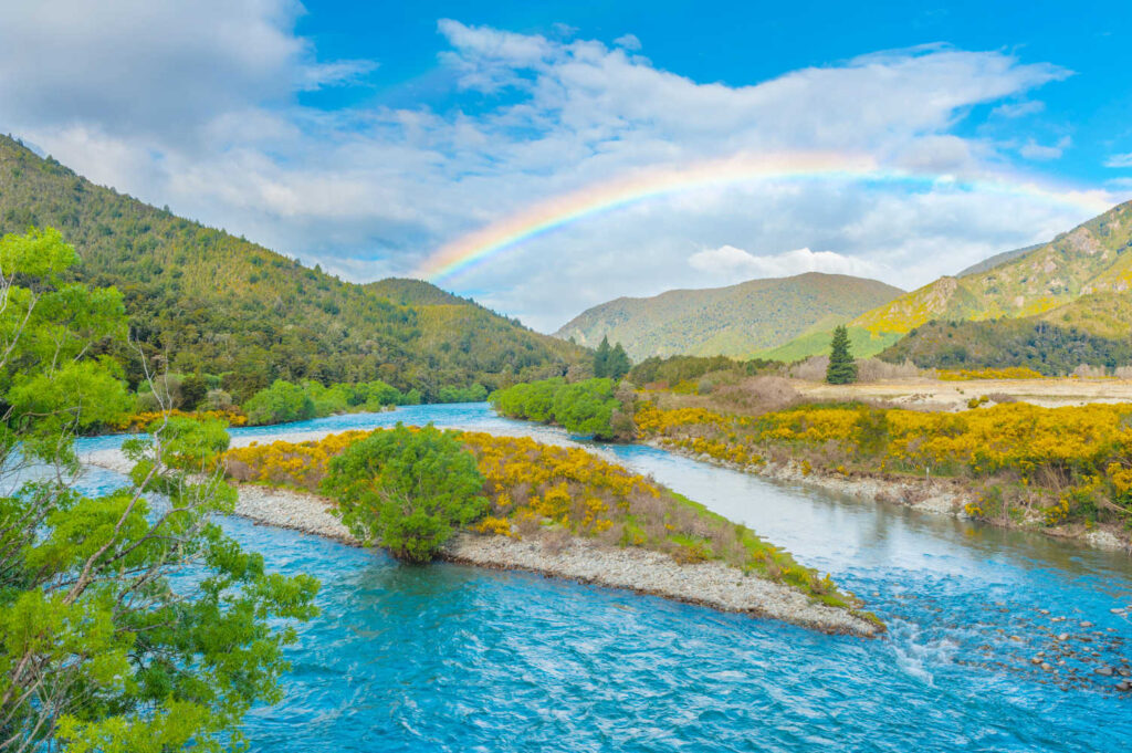 Rainbow over river Rakaia in the South Island in the New Zealand