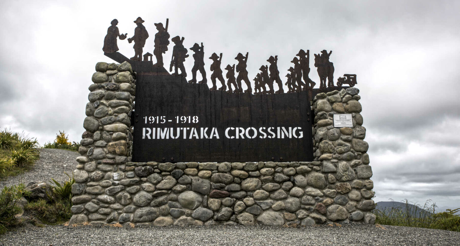 Rimutaka Crossing Sign, at the highest point of the winding road from Wellington to the Wairarapa, NZ, New Zealand