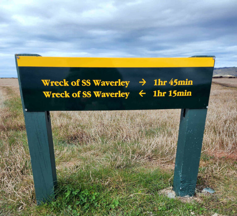 Wairau Lagoon walk DOC signage to SS Waverley evocative rusting shipwreck, Marlborough NZ