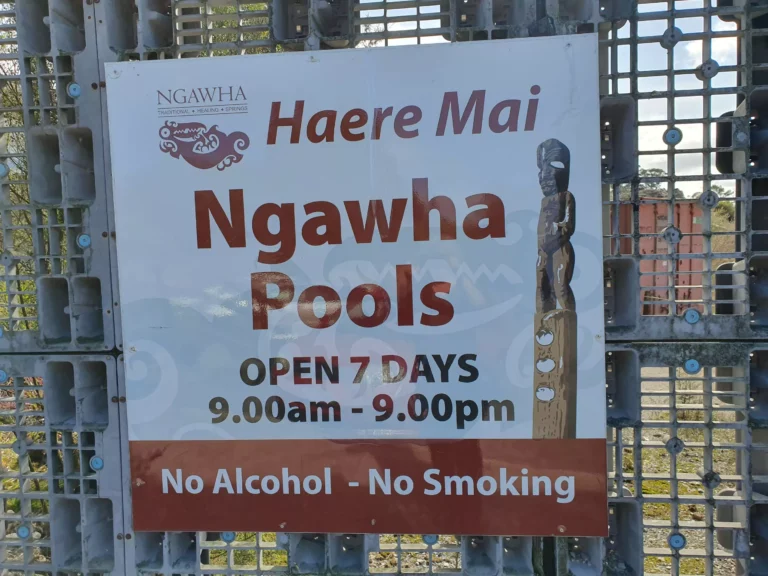 Ngawha Hot Pools signage on pallet fencing