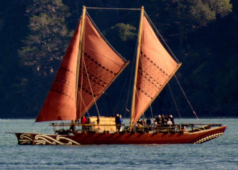 Polynesian tradtional double hull waka under sail , Te Aurere in Auckland Harbour