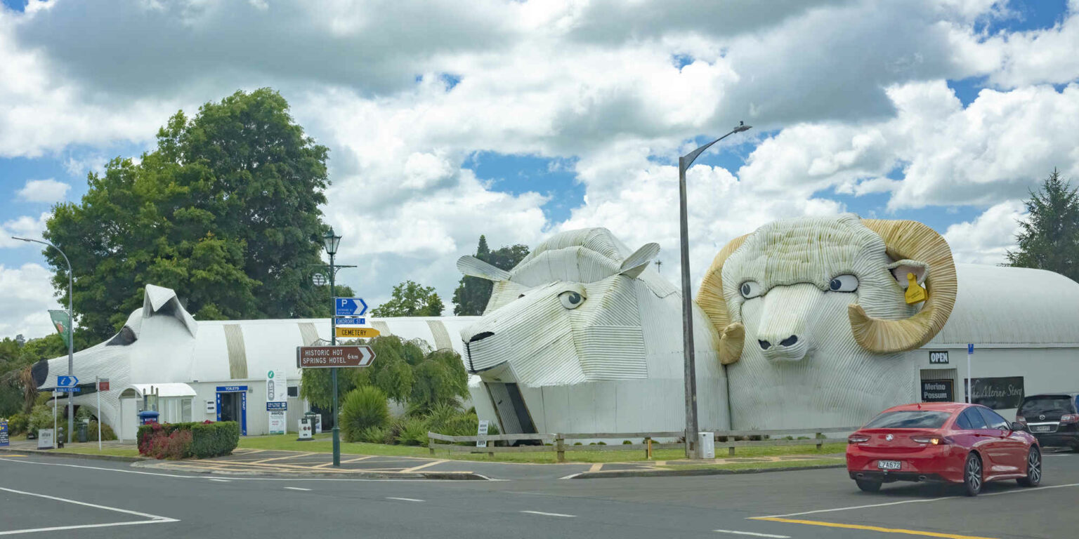 Unique buildings of corrugated iron sheep, ram and sheep dog that housing Visitor Information Center in Tirau, Waikato New Zealand